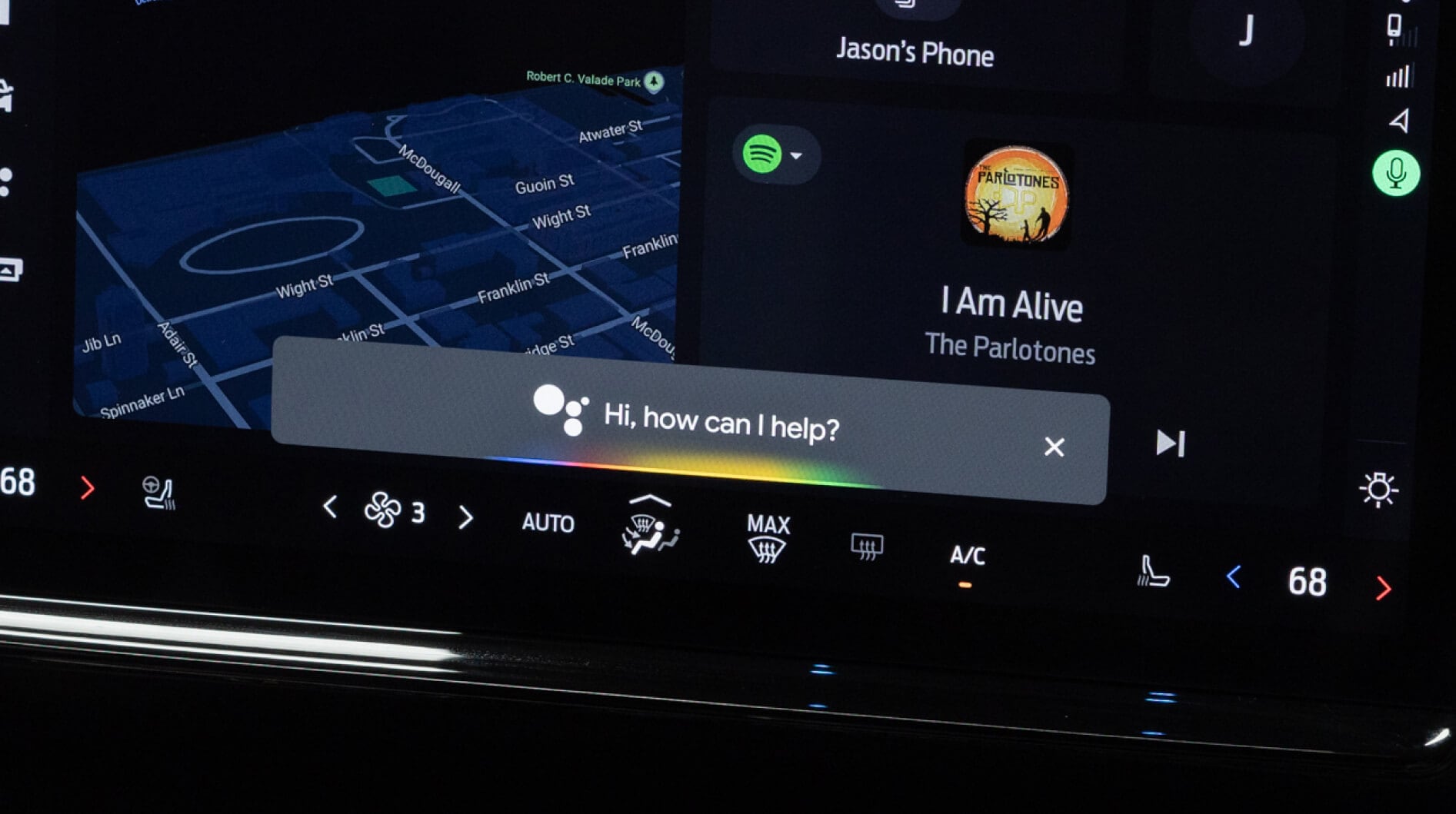 Close-up of a driver holding the steering wheel while sitting inside a Ford SUV..